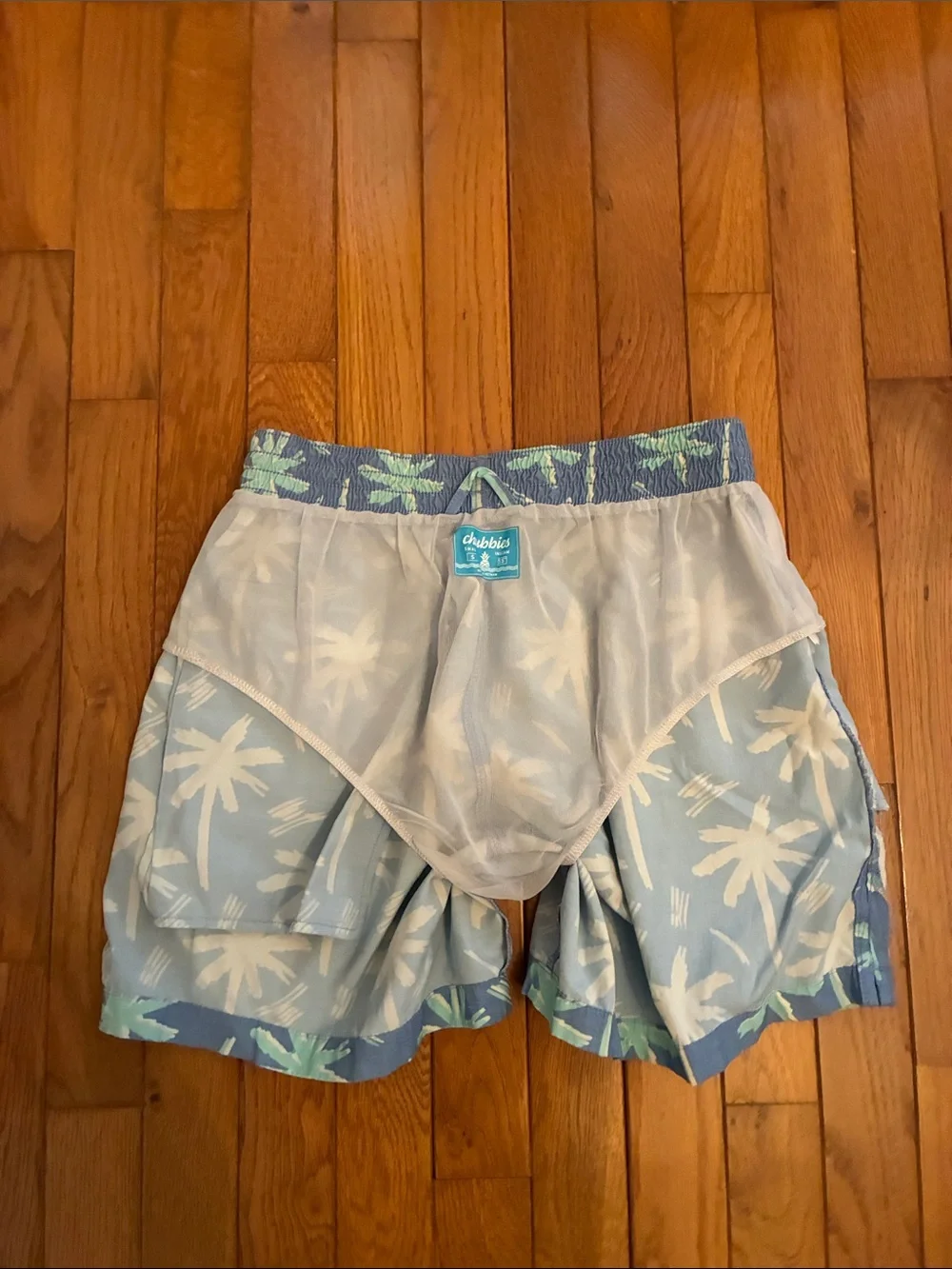 Chubbies Palm Tree Swim Trunks (Light Blue & Mint Green)